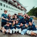Stranded Rotary volunteers arrive home in style