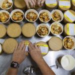 Rotary editors team up with OzHarvest to cook meals for those in need